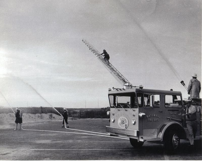 Engine 102- &quot;The Stinger&quot; a 1972 American LaFrance operates at a training with the Master Streams and Ladder Truck.