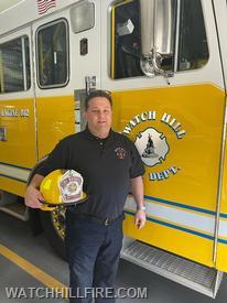 Watch Hill Fire Marshal Chris Moore poses next to Engine 102 during his first full week on the job as WHFD's newest hire.